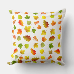 Golden, Green, Orange Autumn Leaves on White Cushion