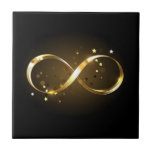 Golden Infinity Symbol Ceramic Tile<br><div class="desc">Gold,  jewellery infinity symbol with gold stars on a black background. Design with gold  star.</div>