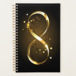 Golden Infinity Symbol Planner<br><div class="desc">Gold,  jewellery infinity symbol with gold stars on a black background. Design with gold  star.</div>