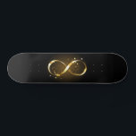 Golden Infinity Symbol Skateboard<br><div class="desc">Gold,  jewellery infinity symbol with gold stars on a black background. Design with gold  star.</div>