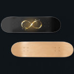 Golden Infinity Symbol Skateboard<br><div class="desc">Gold,  jewellery infinity symbol with gold stars on a black background. Design with gold  star.</div>