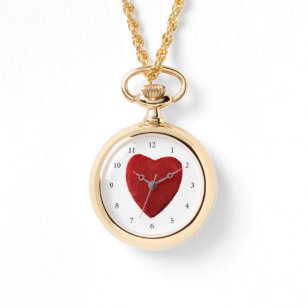 Golden ladies wrist-watch with heart watch