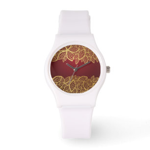 Golden leaf lace on red background watch