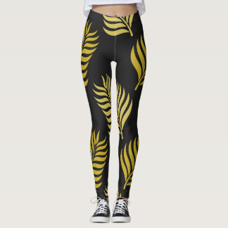 Golden leaves on black background leggings