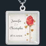 Golden Love Hearts and Red Wedding Silver Plated Necklace<br><div class="desc">An elegant necklace to celebrate your nuptials featuring golden coloured love hearts hanging behind a long stemmed red rose bud. The background is a subtle pattern of love hearts. The text is fully customisable for your own special occasion.</div>