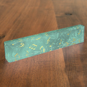 golden music notes in petrol nameplate