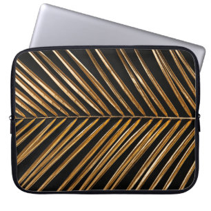 Golden painted date palm leaf closeup on abstract  laptop sleeve