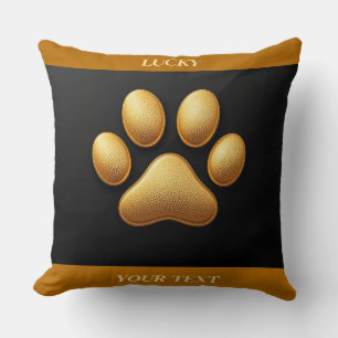 Golden Paw Print Against Black Background Cushion