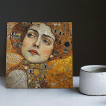 Golden Phase Gustav Klimt Mosaic Edwardian Woman C Ceramic Tile<br><div class="desc">This beautiful ceramic tile features an artwork inspired by Gustav Klimt's "golden phase, " depicting a woman from the Edwardian era. During this period, Klimt was fascinated with Byzantine mosaics and developed his mosaic technique using gold leaf and vibrant colours. This artwork pays tribute to Klimt's innovative mosaic approach and...</div>