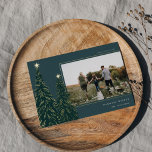 Golden Pine | Elegant Christmas Photo Foil Holiday Card<br><div class="desc">A modern and elegant Christmas holiday card design featuring a horizontal photo on a deep spruce green background adorned with pine trees trimmed with gold foil and topped with stars. Personalise with your custom holiday greeting,  family name and the year.</div>