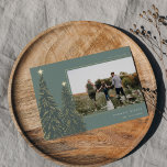 Golden Pine | Elegant Christmas Photo Foil Holiday Card<br><div class="desc">A modern and elegant Christmas holiday card design featuring a horizontal photo on a deep spruce green background adorned with pine trees trimmed with gold foil and topped with stars. Personalise with your custom holiday greeting,  family name and the year.</div>