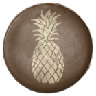 golden pineapple on brown