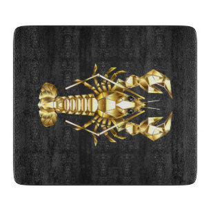 Golden polygonal lobster crawfish on black cutting board