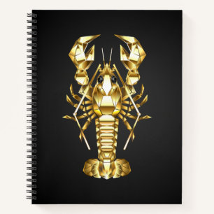 Golden polygonal lobster crawfish on black notebook