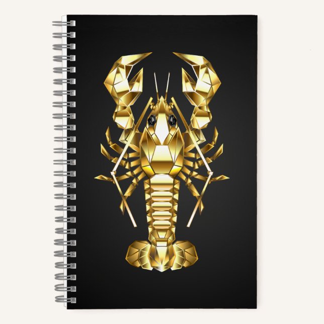 Golden polygonal lobster crawfish on black notebook (Front)