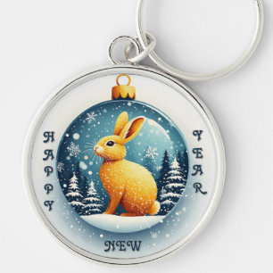 Golden Rabbit Sitting in a Festive Snow Globe Key Ring