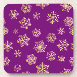 Golden snowflakes on a purple background coaster