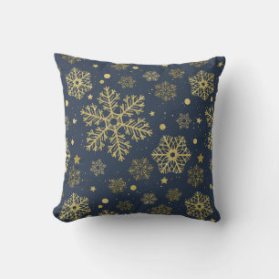Golden snowflakes on navy cushion