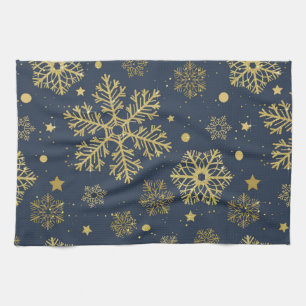 Golden snowflakes on navy tea towel
