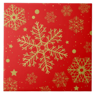 Golden snowflakes on red ceramic tile