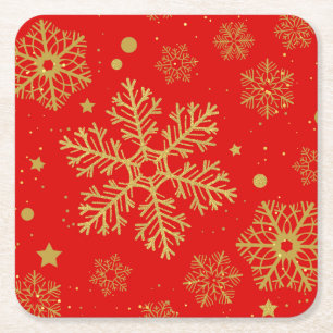 Golden snowflakes on red square paper coaster