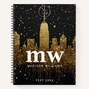 Golden sparkly city skyline black logo notebook