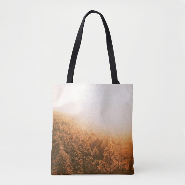 GOLDEN SUN OVER A FOREST TOTE BAG (Front)