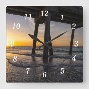 Golden Sunrise Under Pensacola Pier Wall Clock