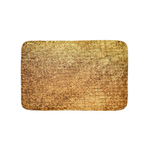 Golden textile: glamourous macro background. bath mat