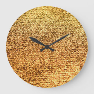 Golden textile: glamourous macro background. large clock