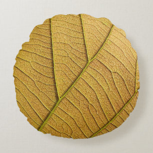 Golden yellow leaf pattern in the morning. round cushion