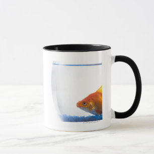 Goldfish in bowl on white background mug