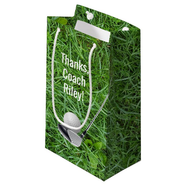 Golf Ball and Club on grass thanks to coach Small Gift Bag (Front Angled)