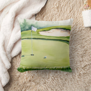 Golf ball and flag on putting green cushion
