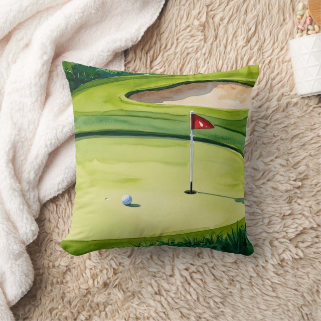 Golf ball and flag on putting green cushion (Blanket)