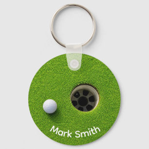 Golf Ball Next to Hole on Green Grass Golf Course  Key Ring