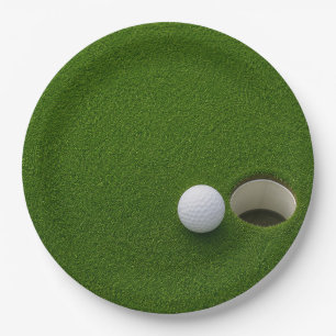 Golf Ball Next to Hole on Green Grass Golf Course Paper Plate