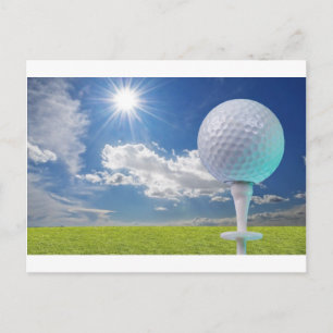 golf ball on a tee with grass postcard