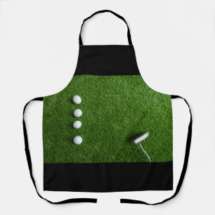 Golf ball on green grass apron