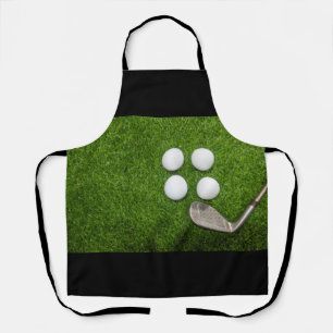Golf ball on green grass apron