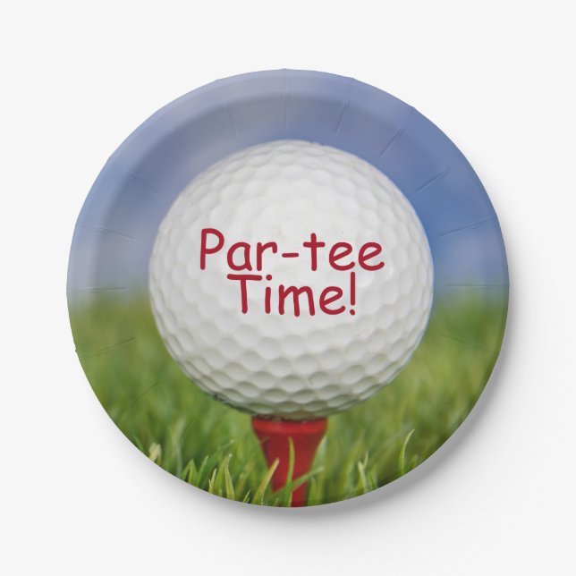golf ball on red tee in grass paper plate (Front)