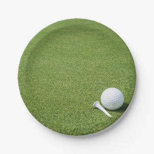 Golf ball with tee on green grass golfer party paper plate