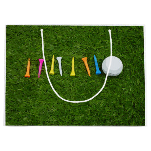 Golf ball with tees on green grass golf large gift bag