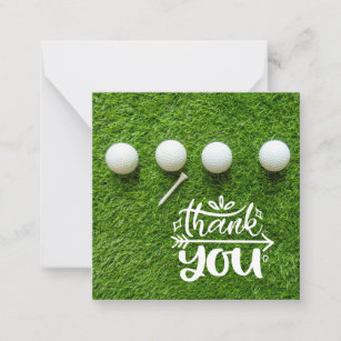 Golf ball with thank you so much on green grass card