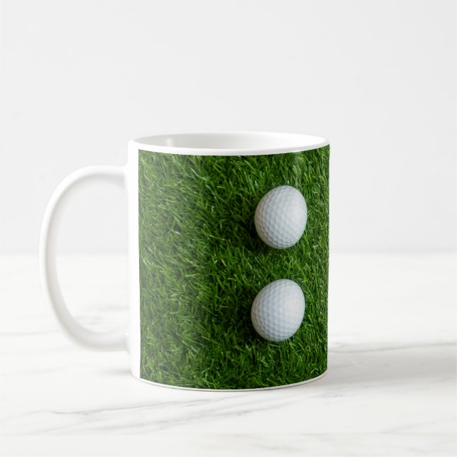 Golf Balls are on green grass Coffee Mug (Left)