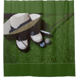 Golf balls are on green grass for golfer bathroom shower curtain