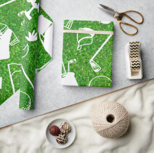 Golf equipment on green grass background wrapping paper
