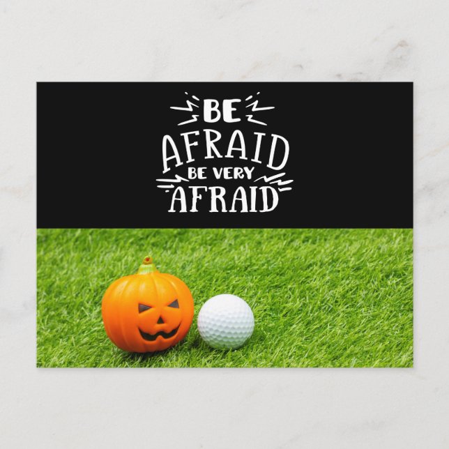 Golf Halloween with golf ball and pumpkin on green Postcard (Front)