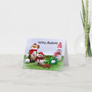 Golf Merry Christmas with Snowman on green grass Holiday Card