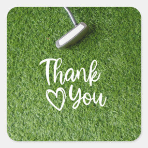 Golf putter are on green grass Thank you Square Sticker